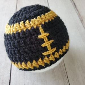Baby Crochet Football Hat. Football Hat with Bow. Black & Gold Hat. Crochet Photo Prop. Saints Inspired Hat. Baby Shower Gift. READY TO SHIP