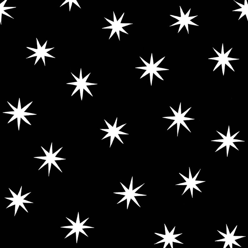 May include: A black background with a repeating pattern of white, eight-pointed stars.