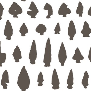 May include: A seamless pattern of brown arrowheads on a white background. The arrowheads are of various shapes and sizes, and some are more stylized than others.