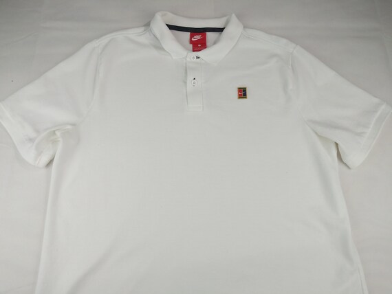 white nike collared shirt