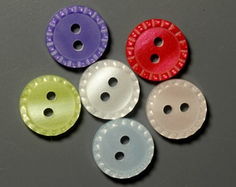 Round two hole button with raised decorative edge*Pricing for 6 buttons*