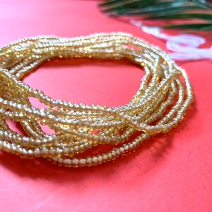 Adjustable ~50 inches waist beads strand made with 100% organic cotton (One strand) “MWANAMKE”