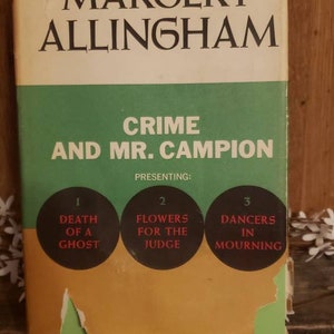May include: A book cover with a green and yellow background. The title is "Crime and Mr. Campion" by Margery Allingham. The cover features three circles with the titles "Death of a Ghost", "Flowers for the Judge", and "Dancers in Mourning".
