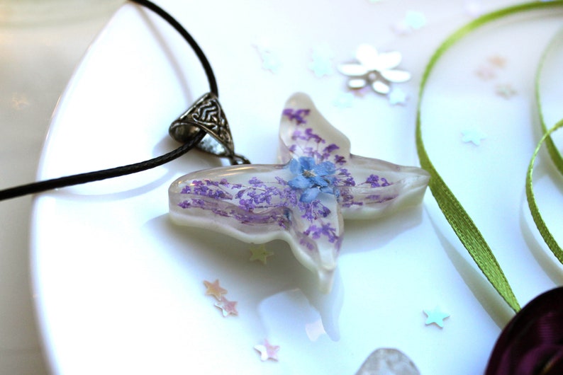 white resin butterfly pendant real dried flowers