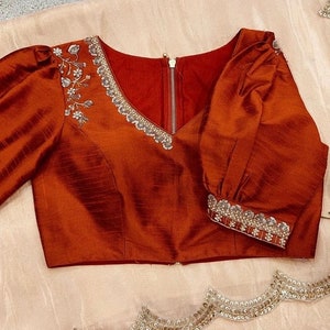 Women Peach Tissue Silk Saree With UnStiched Blouse