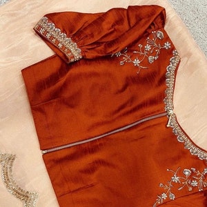 Women Peach Tissue Silk Saree With UnStiched Blouse