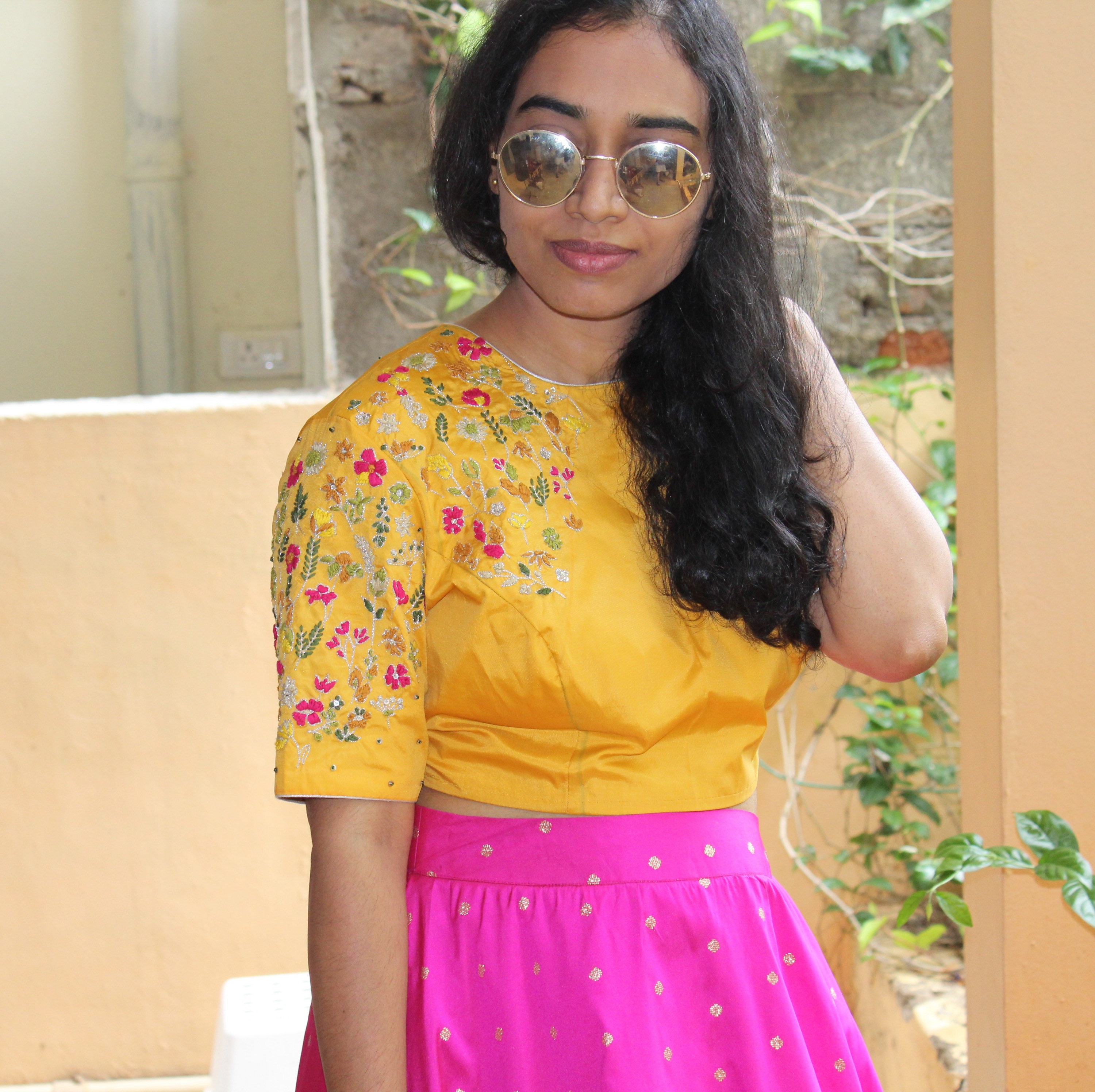 yellow top and pink skirt