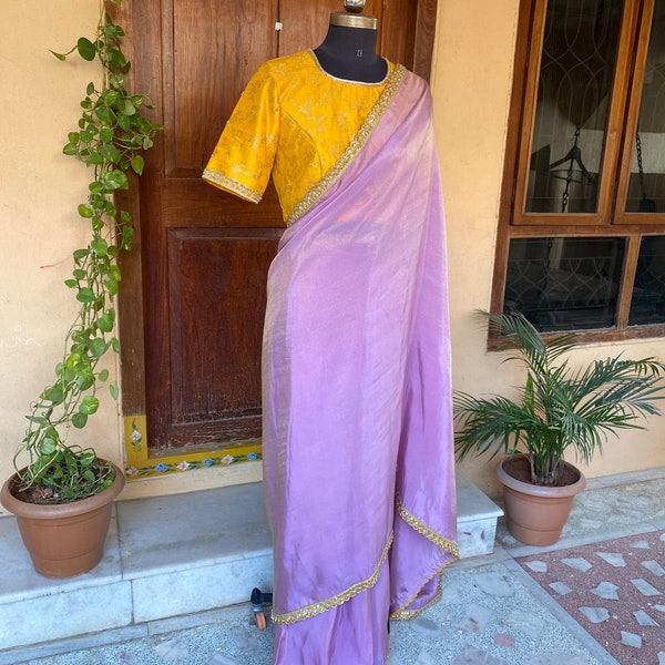 Pale Lavender Color All Over Floral Patch Work Design Tissue Saree With Running Blouse