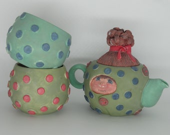 Ceramic pot for use with a face and two ceramic cups for your new home gift for a newly married couple