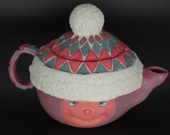 Cute ceramic teapot for two with a smily face and cap wonderful gift for grandma