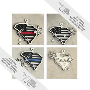 以下が含まれることがあります： サウスカロライナ州の輪郭のオーナメントの4つの異なるデザイン。各オーナメントは、赤と青の細いラインの旗、青い細いラインの旗、赤い細いラインの旗、そして「home sweet home」という言葉が書かれた白い輪郭という、異なるデザインを特徴としています。