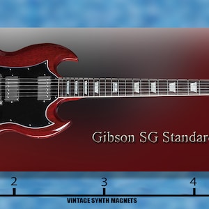 May include: A red Gibson SG Standard 120 electric guitar with a black pickguard. The guitar is 4 inches long.