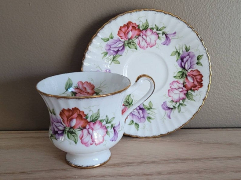 pink and lavender flowers scalloped gold edge Paragon Tea Cup and Saucer red