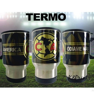 May include: Three stainless steel travel mugs with black and gold designs. The mugs feature the words "America", "Club America", and "Odiame Mas".