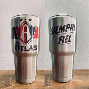 30oz Tumbler stainless steel Rojinegros del Atlas Campeon Cup. Colors silver and white. 2 Estrellas Atlas printed with permanent ink.