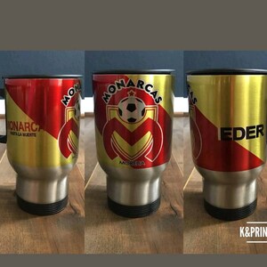 Termo Monarcas Morelia 16 oz stainless steel travel mug. Coffee mug. White and Silver colors.