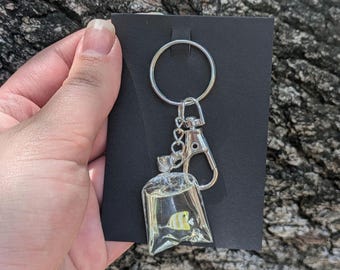 Resin Fish in a Bag Keychain: Silver Plated Key Ring - Main Image