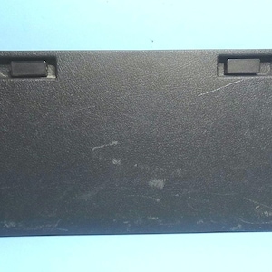 Couvercle du compartiment de rangement arrière gauche du Hummer H3 2006-2010
