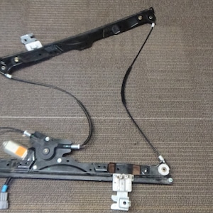 2004-2010 Nissan Armada Titan Passenger Side Window Regulator With Motor