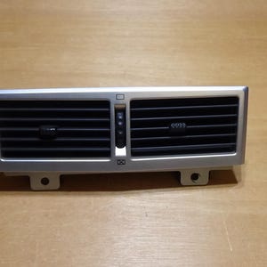 2004-2008 Chrysler Crossfire Center Ventilatieopeningen dashboard, zilver