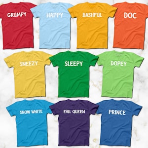 May include: Ten t-shirts with different colors and text. The text on the shirts includes "Grumpy", "Happy", "Bashful", "Doc", "Sneezy", "Sleepy", "Dopey", "Snow White", "Evil Queen", and "Prince".