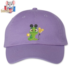 May include: Purple baseball cap with an embroidered image of a green chameleon wearing Mickey Mouse ears and holding a balloon. The chameleon is wearing a black Mickey Mouse hat.