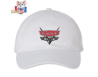 May include: White baseball cap with an embroidered Cars Land logo in red, gray, and black.