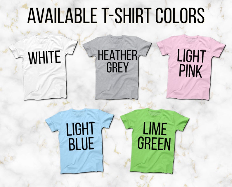 May include: Five t-shirts in different colors, showing the available colors for purchase. The colors are white, heather grey, light pink, light blue, and lime green.