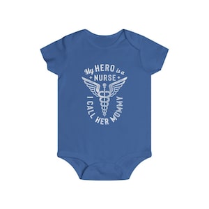 May include: A blue baby onesie with a white graphic that says "My hero is a nurse I call her mommy" with a caduceus symbol and wings.