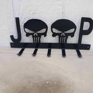 2 llaveros de montaje en pared con diseño de calavera de Punisher