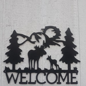 Metal moose welcome sign