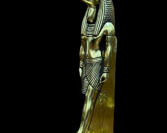 Thoth - Egyptian statue of god of wisdom and knowledge covered by gold leaf / Egyptian mythology / ancient Egyptian / made in Egypt.