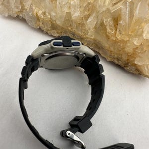 May include: A rustic wooden sign with the text "Welcome to our home" in a handwritten style. The sign is rectangular, with a distressed finish, and features a simple, inviting design. It's suitable for indoor or outdoor use.