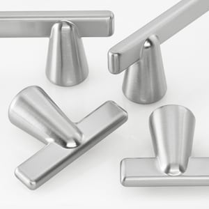 May include: A collection of four T-shaped cabinet knobs made of brushed silver-toned metal. Each knob features a horizontal bar attached to a conical base with a smooth, matte finish. The hardware is arranged in a cluster, showcasing the uniform metallic texture and the distinct geometric design of the individual pieces.