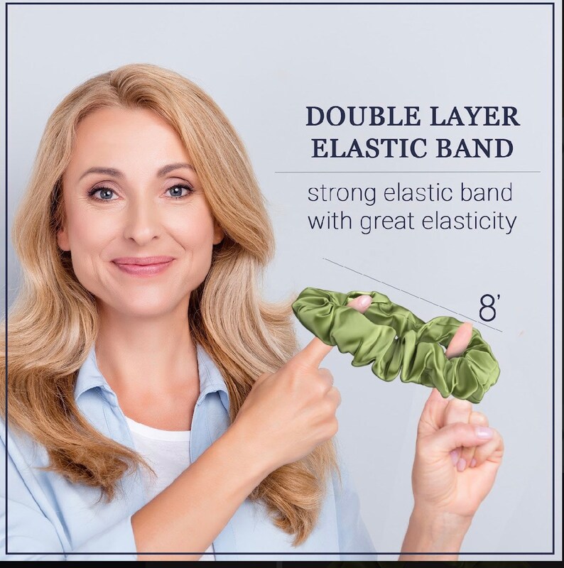 May include: A green double layer elastic hair scrunchie with a diameter of 8 inches. The scrunchie is made of a soft, silky material and is designed to be gentle on hair.