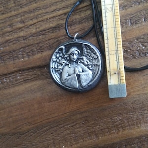 Hand cast and detailed pewter guardian angel necklace