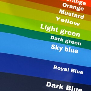 May include: A color chart with 12 different colors, including rose, neon pink, neon orange, orange, mustard, yellow, light green, dark green, sky blue, royal blue, dark blue, purple, and red.