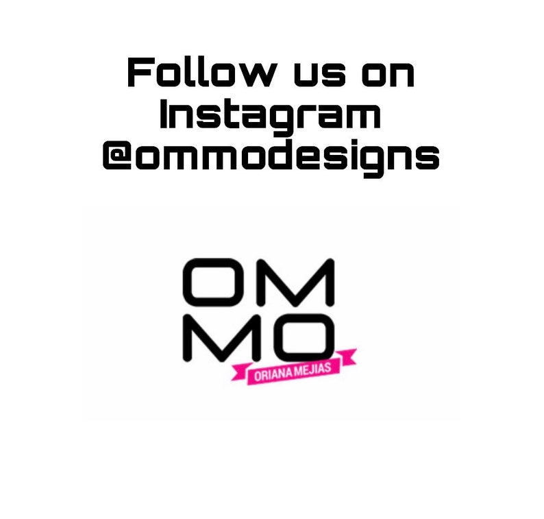 May include: Black and white logo with the letters "OMMO" stacked on top of each other. The logo has a pink ribbon underneath with the text "ORIANA MEJIAS". The text "Follow us on Instagram @ommodesigns" is above the logo.