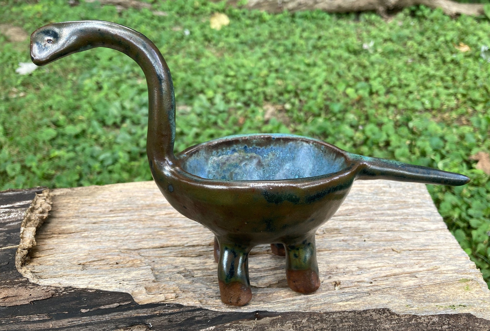 dinosaur with bowl head