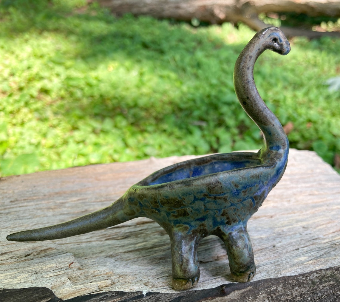 dinosaur with bowl head