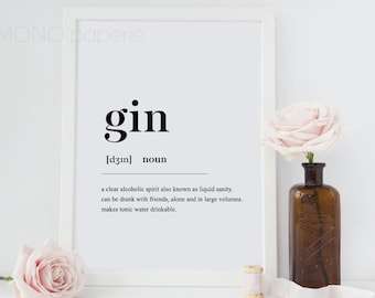 Può includere: Una stampa incorniciata bianca con la parola "gin" in testo nero, definita come "uno spirito alcolico chiaro anche conosciuto come sanità liquida. può essere bevuto con gli amici, da solo e in grandi volumi. rende l'acqua tonica potabile."