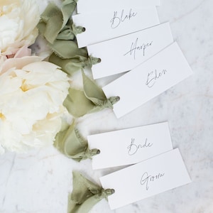 Luxury sage green silk place cards