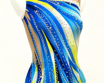 May include: A sleeveless leotard with a vibrant blue, yellow, and white abstract design. The garment is embellished with sparkling rhinestones and features a nude mesh neckline. This athletic wear is likely for gymnastics or dance.