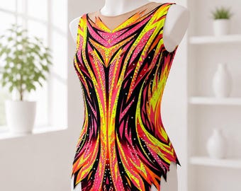 May include: A sleeveless leotard with a vibrant, abstract design in shades of yellow, orange, pink, and black. The leotard is embellished with small, sparkling accents and features a sheer neckline. It is displayed on a white mannequin.