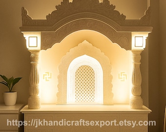 May include: A cream-colored, ornate, carved wooden temple with a domed top and decorative arch. The temple features square lights and a central arched window with a lattice design. The text "https://jkhandicraftsexport.etsy.com" is visible on the base.
