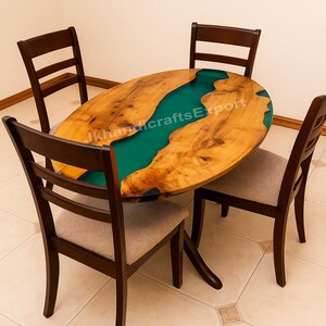May include: Oval wooden dining table with a teal epoxy river design, surrounded by four dark brown chairs with beige upholstered seats. The table's surface has a natural wood grain pattern. The chairs have a classic, simple design.