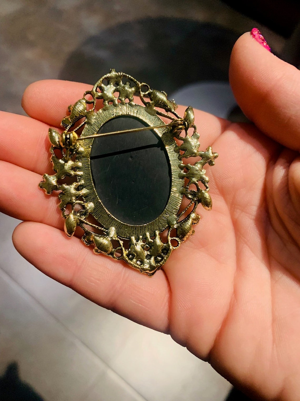 purple cameo brooch