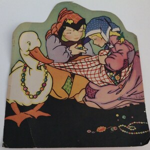 May include: A white goose with a colorful beaded necklace is surrounded by two children. One child is wearing a red and white checkered dress and a blue hat. The other child is wearing a purple and orange outfit with a red hat. The children are holding colorful beads.