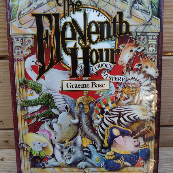 The Eleventh Hour- A Curious Mystery by Graeme Base 1989 Hardcover With Dust Jacket