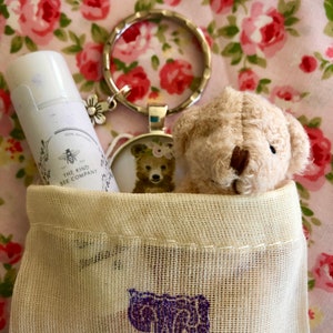 Tiny Teddy Tin. Personalised Gift Pocket Teddy In A Tin and 100% natural honey/Vanilla lip balm & teddy key fob all in an initialled bag